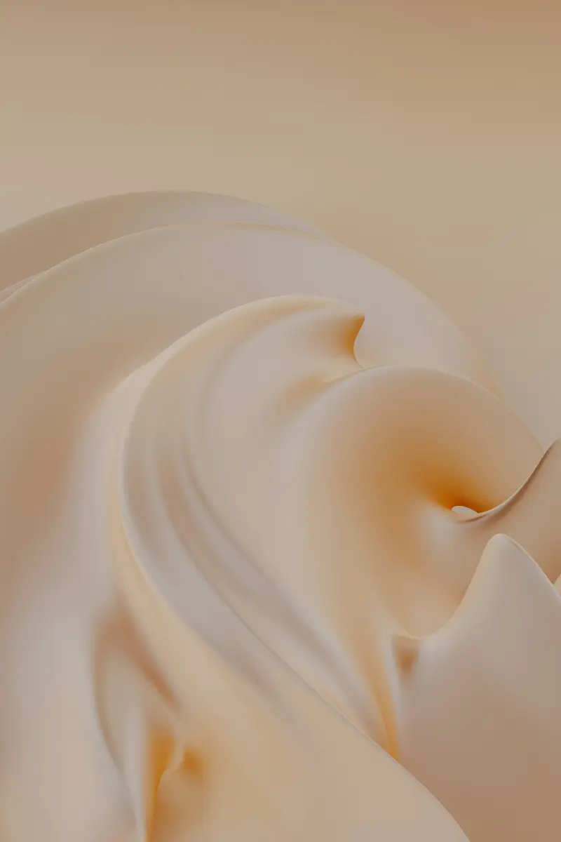 Weiche Wirbel einer beigen Creme